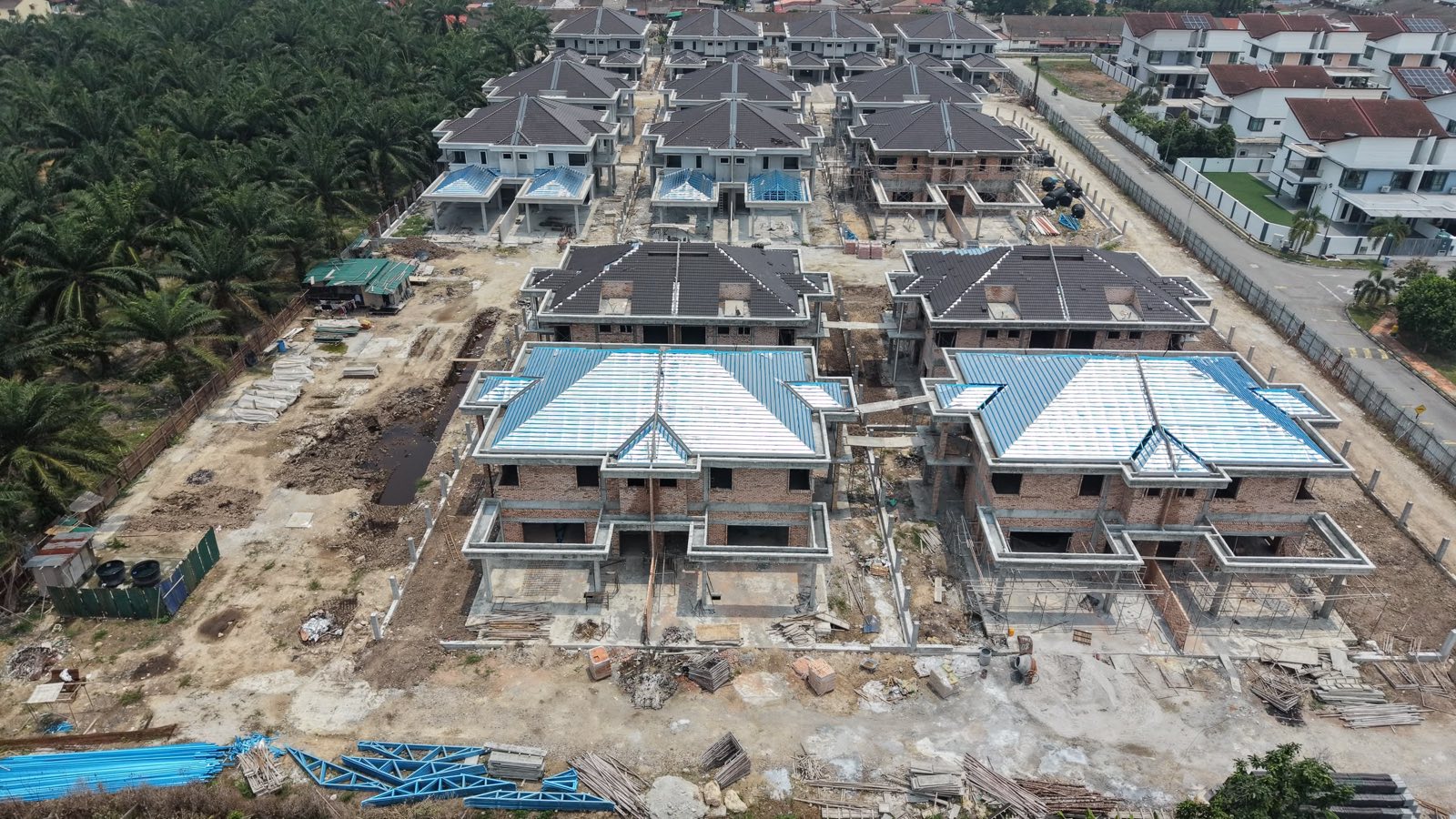 Aerial view of Taman Baiduri construction with roof framing in progress