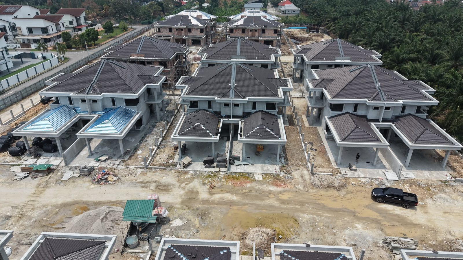 Taman Baiduri semi-detached units with completed roofs and car porches